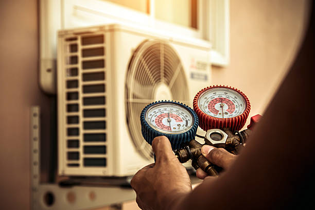 Professional Heat Pump Repair technician working in East Rochester, OH